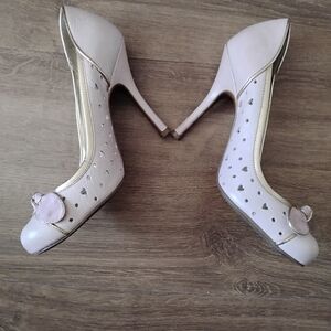 Elegant Cream High Heels with Heart Accents
